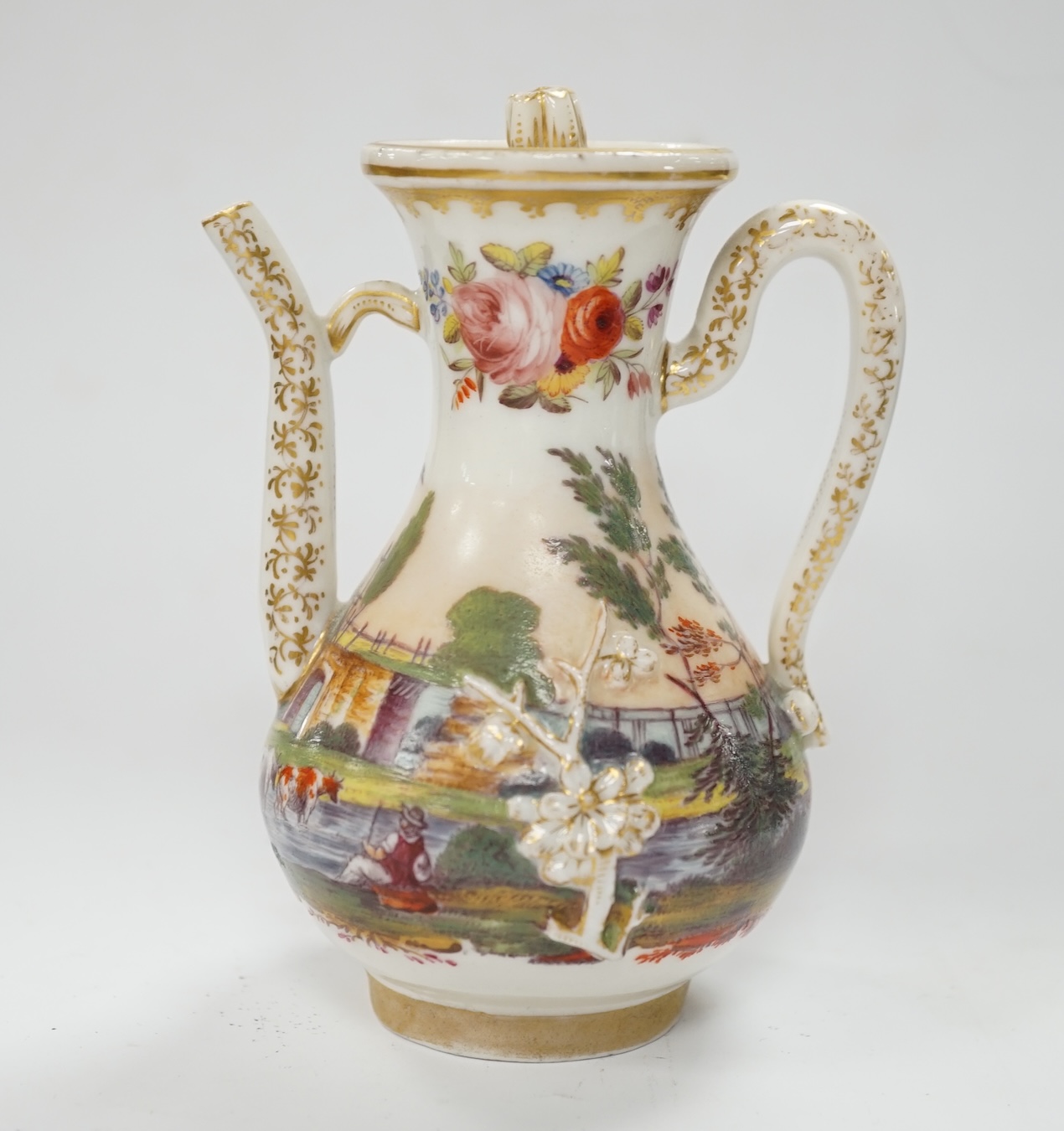 A 19th century Paris porcelain ewer and cover, hand painted with a riverscape and cattle, 13cm high. Condition - fair